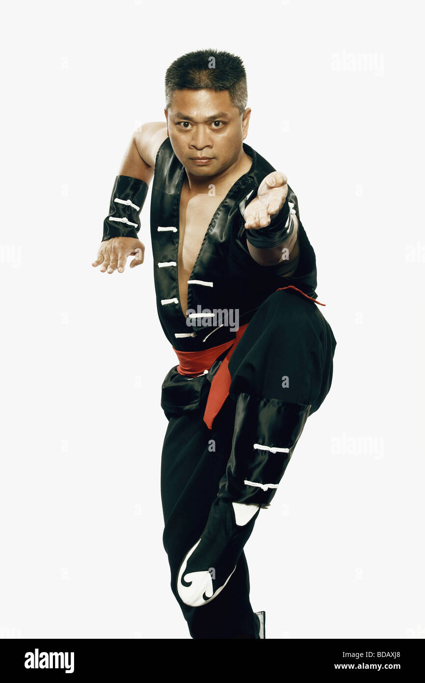 Portrait of a mature man practicing martial arts Stock Photo