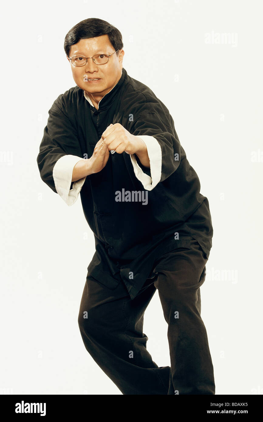 Portrait of a mature man practicing martial arts Stock Photo