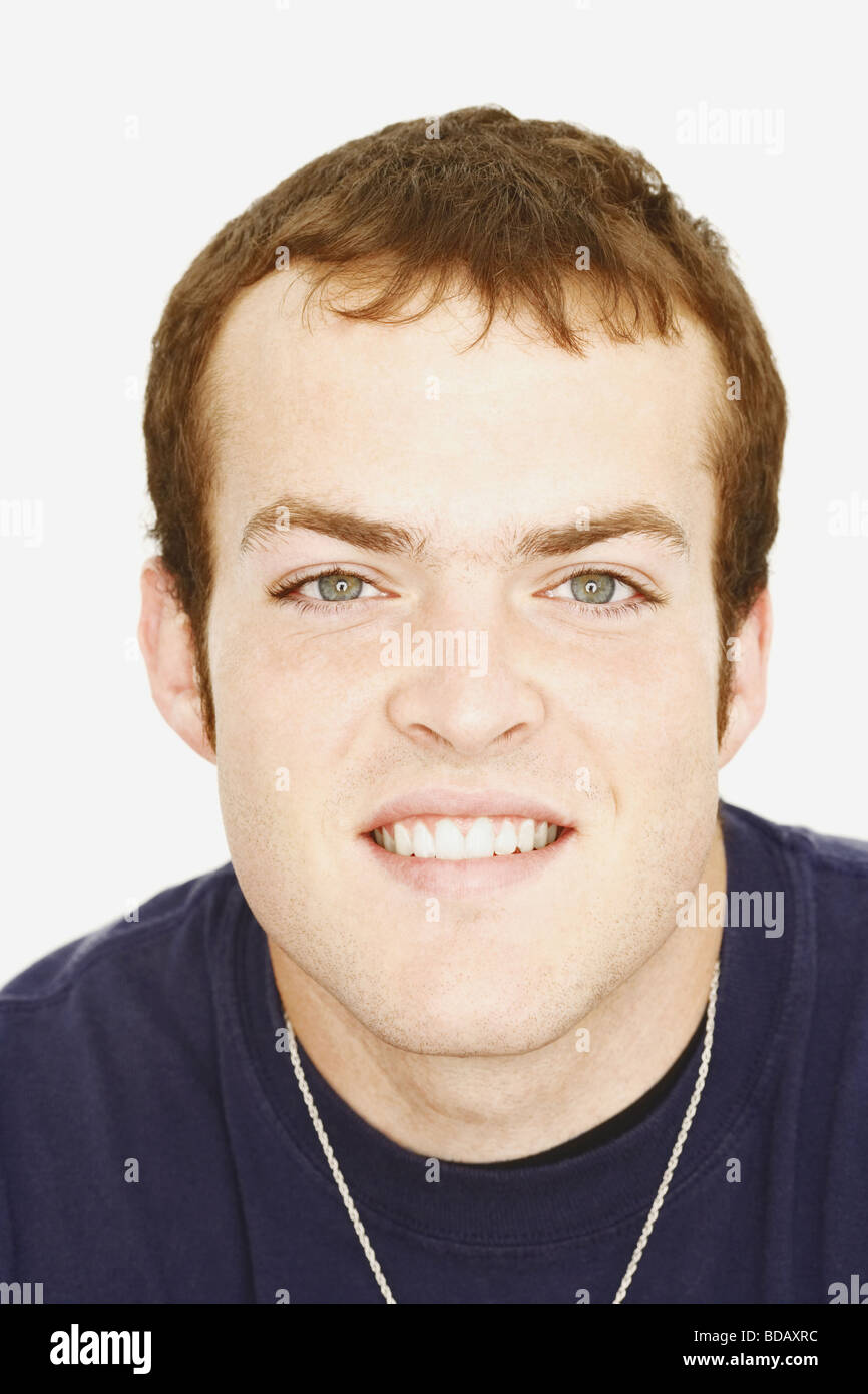 Portrait of a young man smiling Stock Photo - Alamy