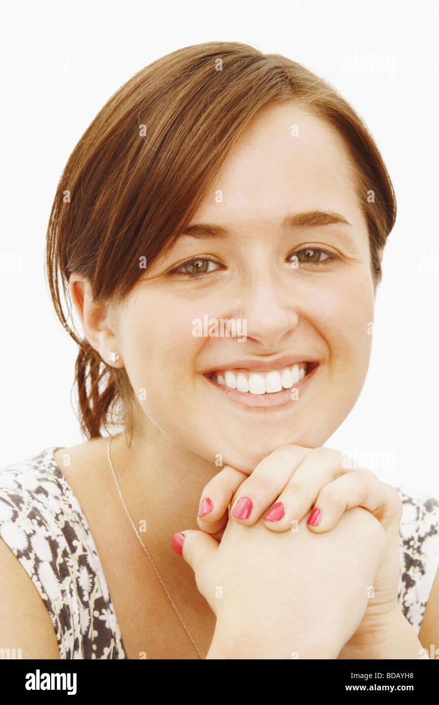 Portrait of a young woman smiling Stock Photo - Alamy