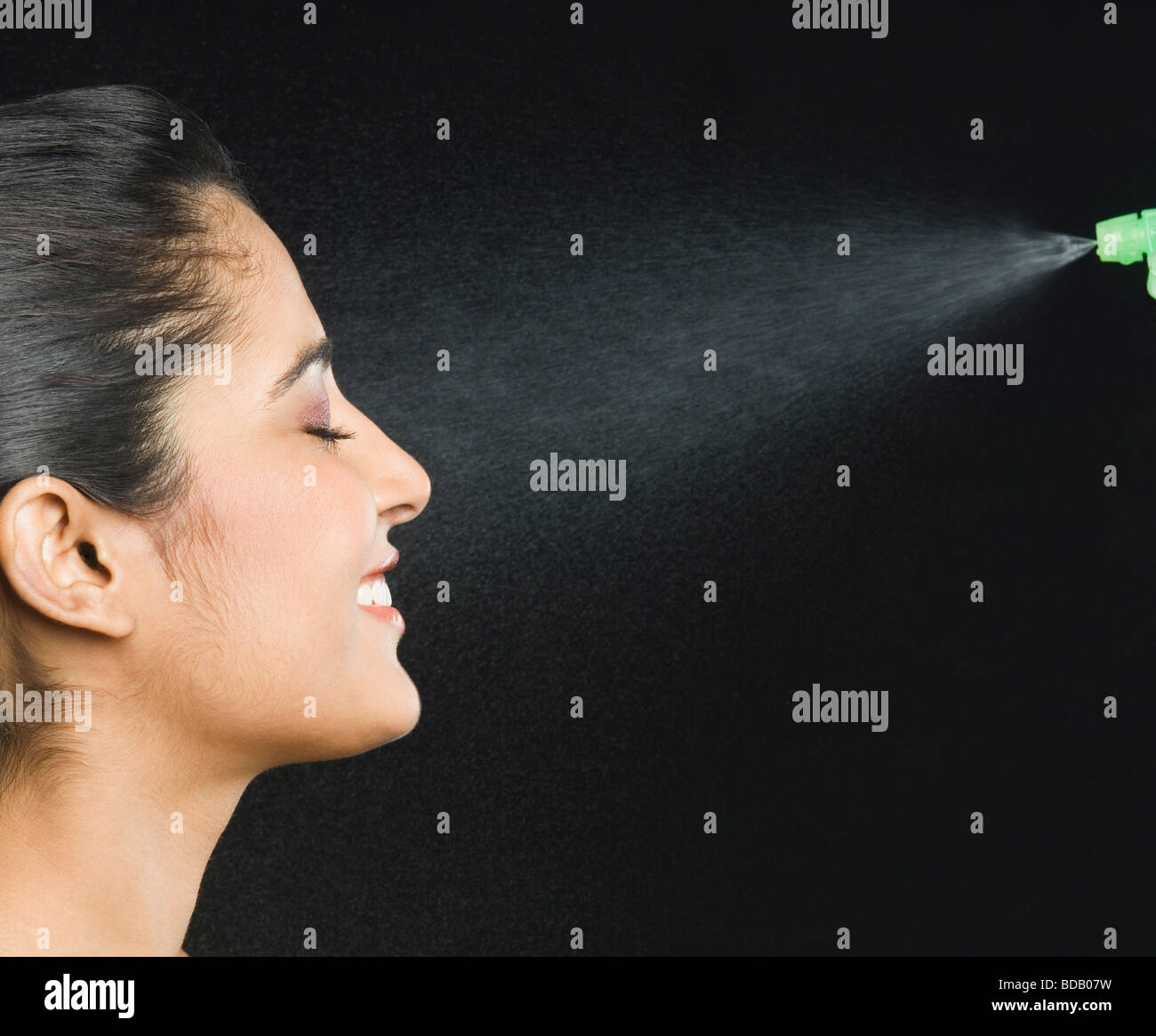 Woman Spray Water Face High Resolution Stock Photography and Images Alamy