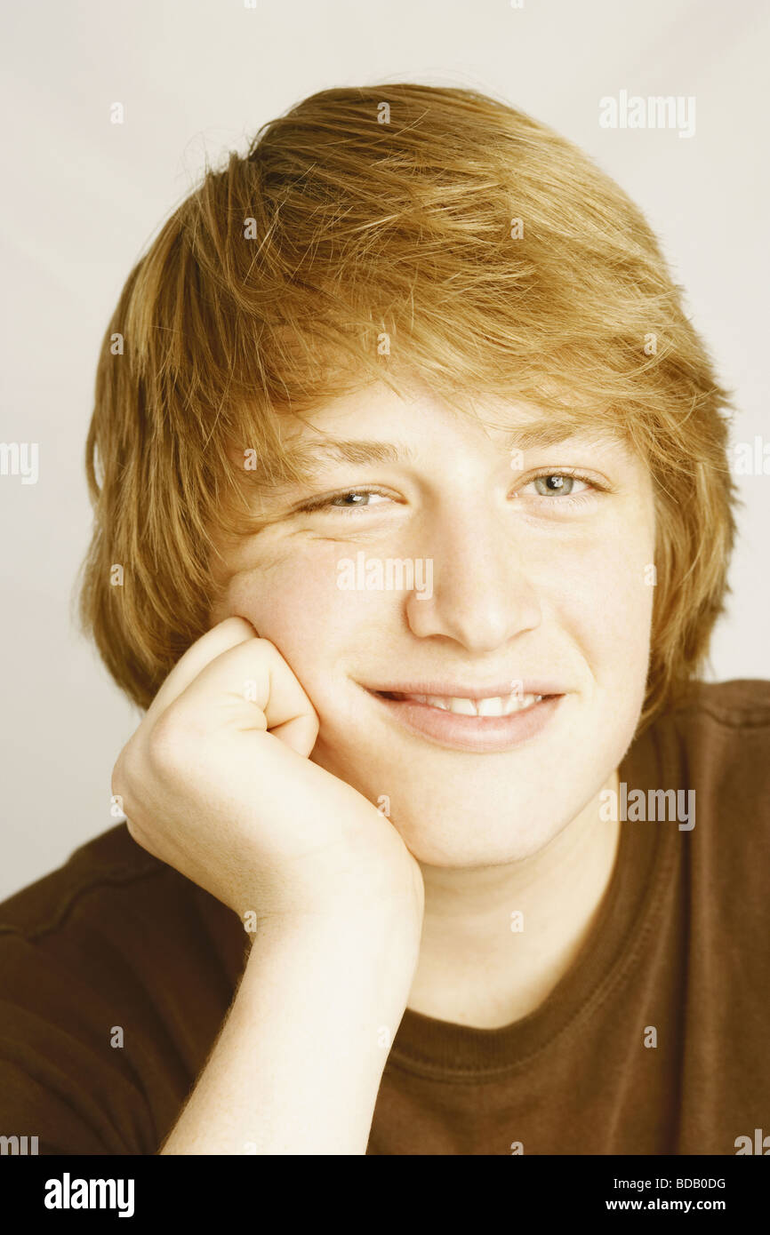 Portrait of a young man smiling Stock Photo - Alamy