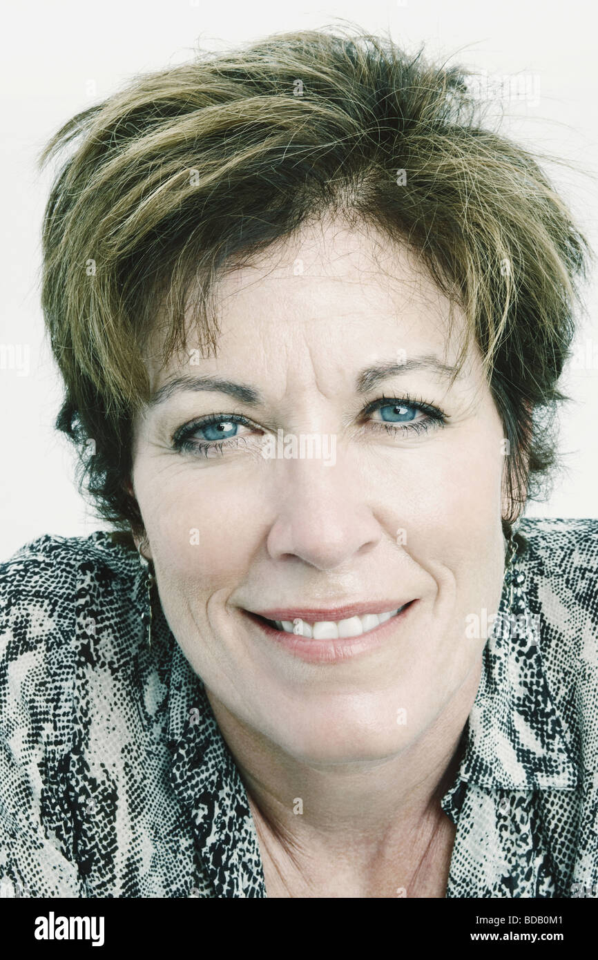 Portrait of a mature woman smiling Stock Photo - Alamy
