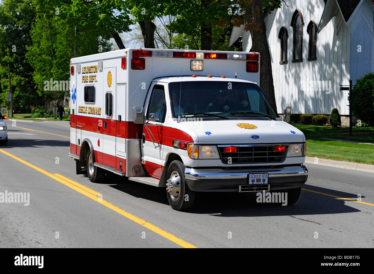 Ambulance racing to automobile accident EMS Stock Photo Alamy