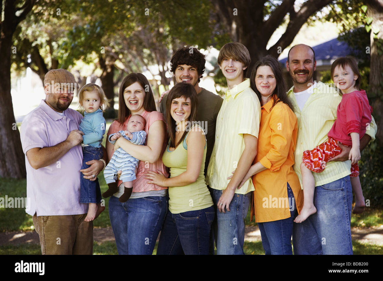 Portrait of a family standing together and smiling Stock Photo