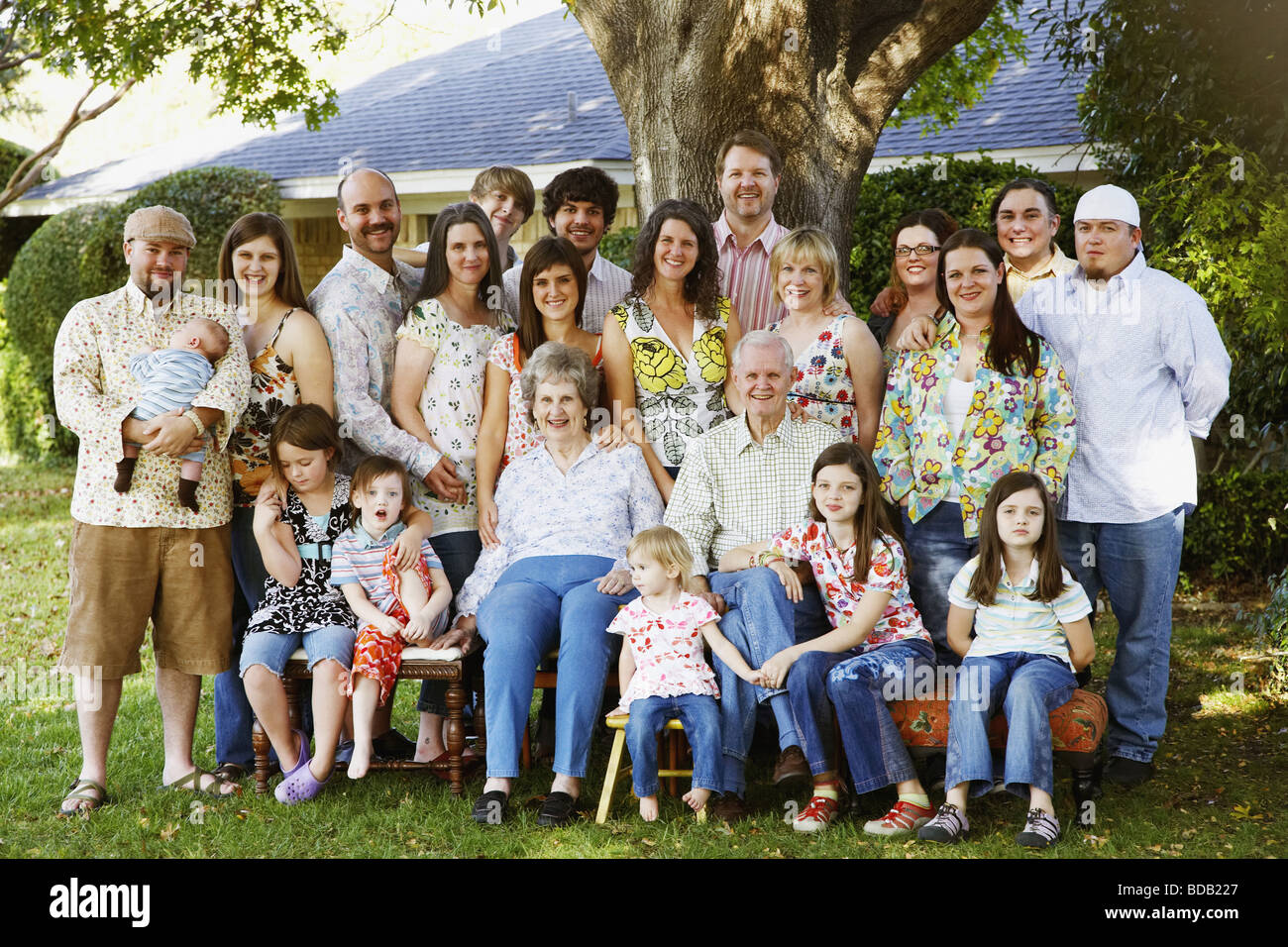 Portrait of a family in a lawn Stock Photo