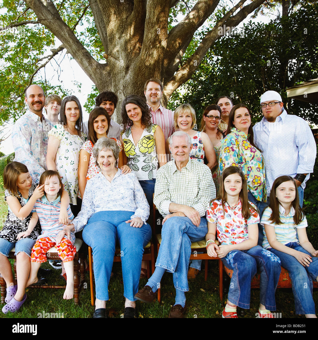 Portrait of a family in a lawn Stock Photo