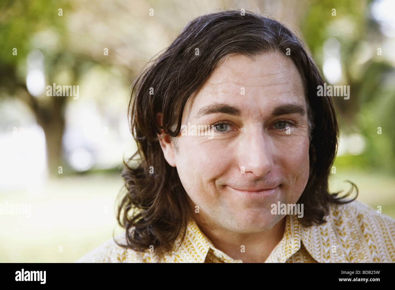 Portrait of a mature man grinning Stock Photo