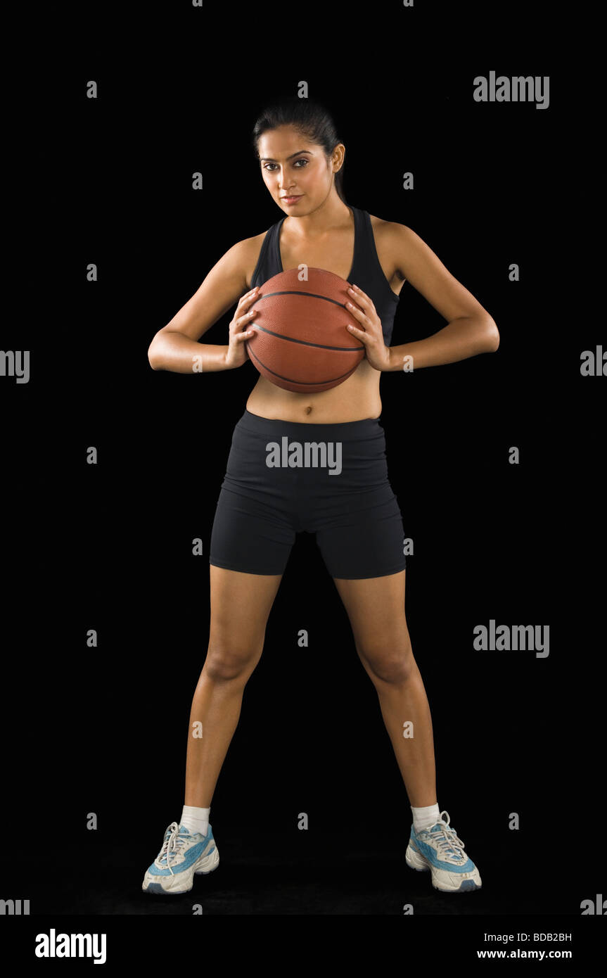 Asian woman holding basketball hi-res stock photography and images - Alamy