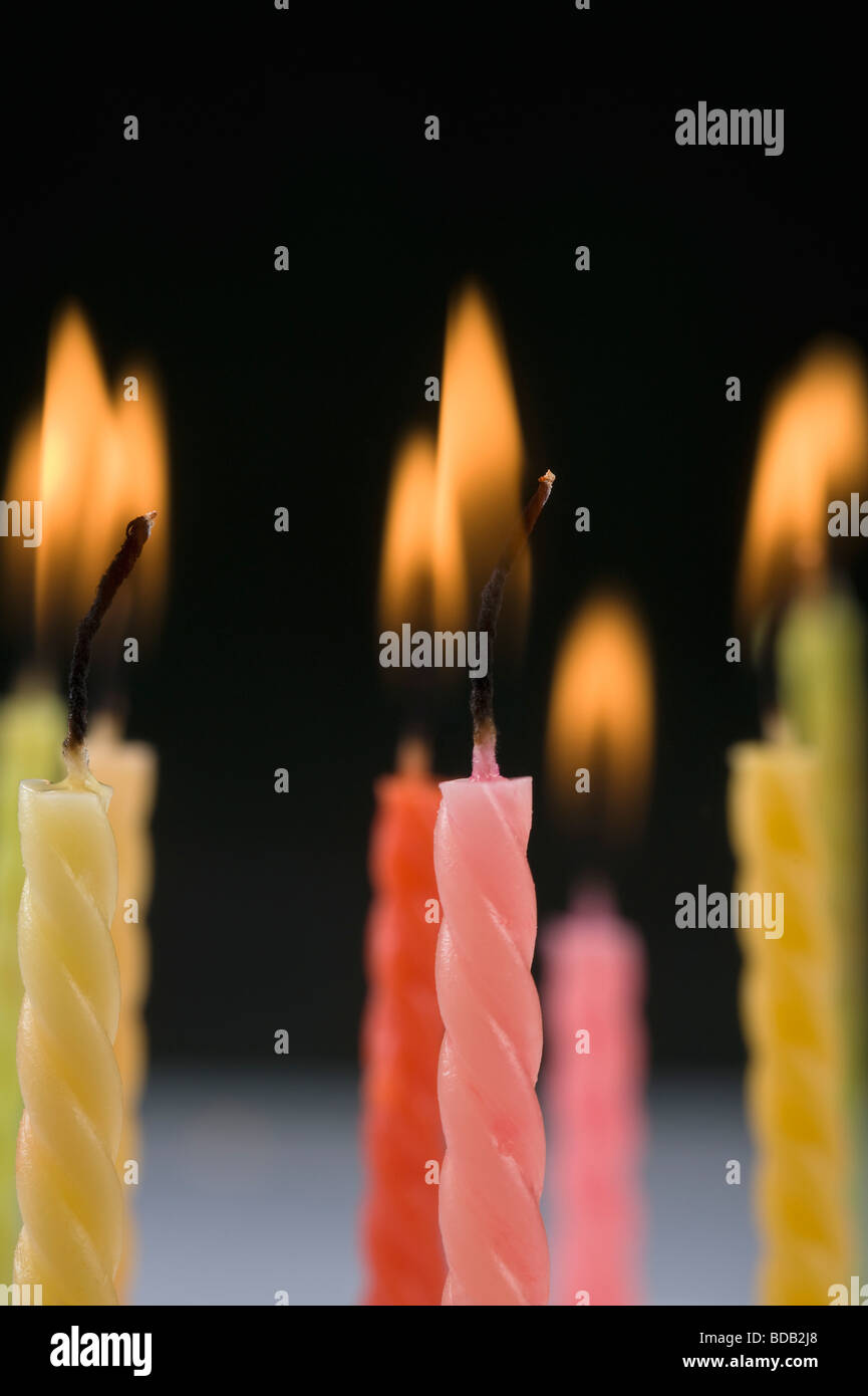 Closeup of burning birthday candles Stock Photo Alamy