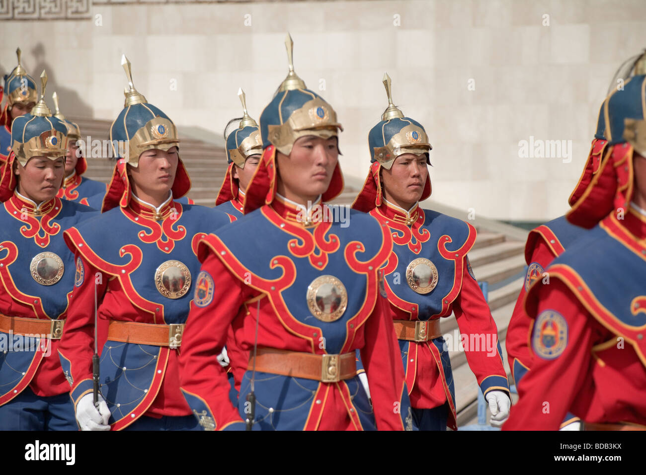 Mongolian soldiers in uniform march past the Government House, Ulaan Baatar, Mongolia Stock Photo