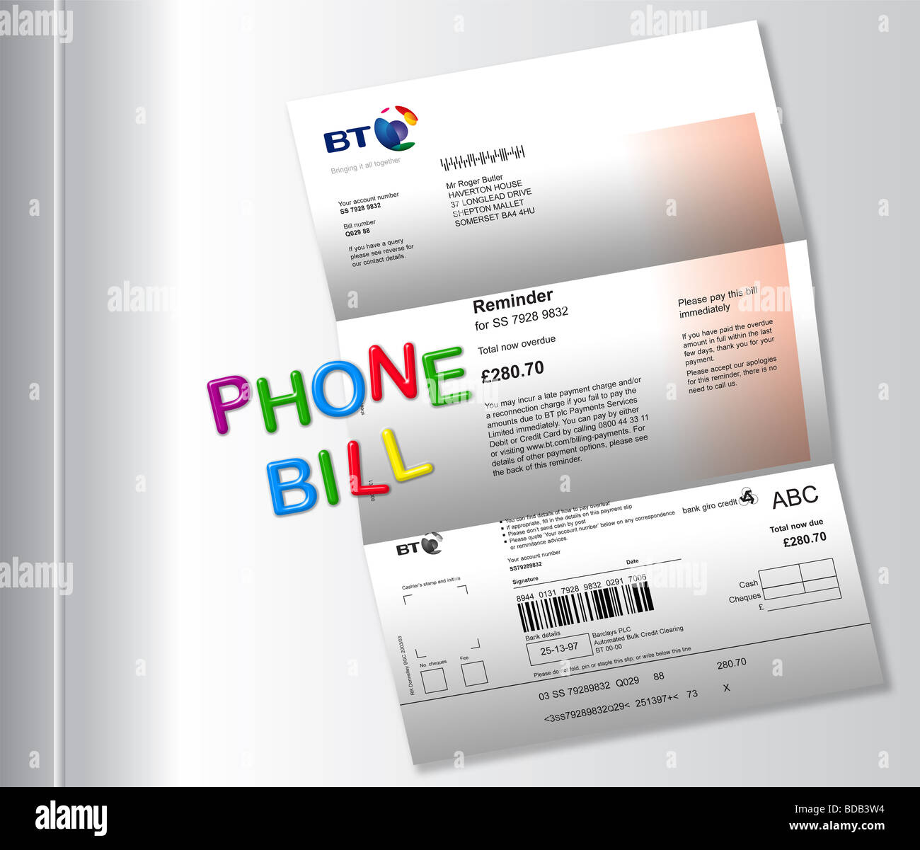 Telephone bill on fridge with ‘PHONE BILL’ spelt out by magnetic fridge letters. Stock Photo