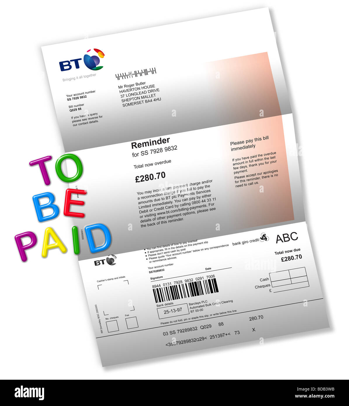 Telephone bill on white with ‘TO BE PAID’ spelt out by magnetic fridge letters. Stock Photo