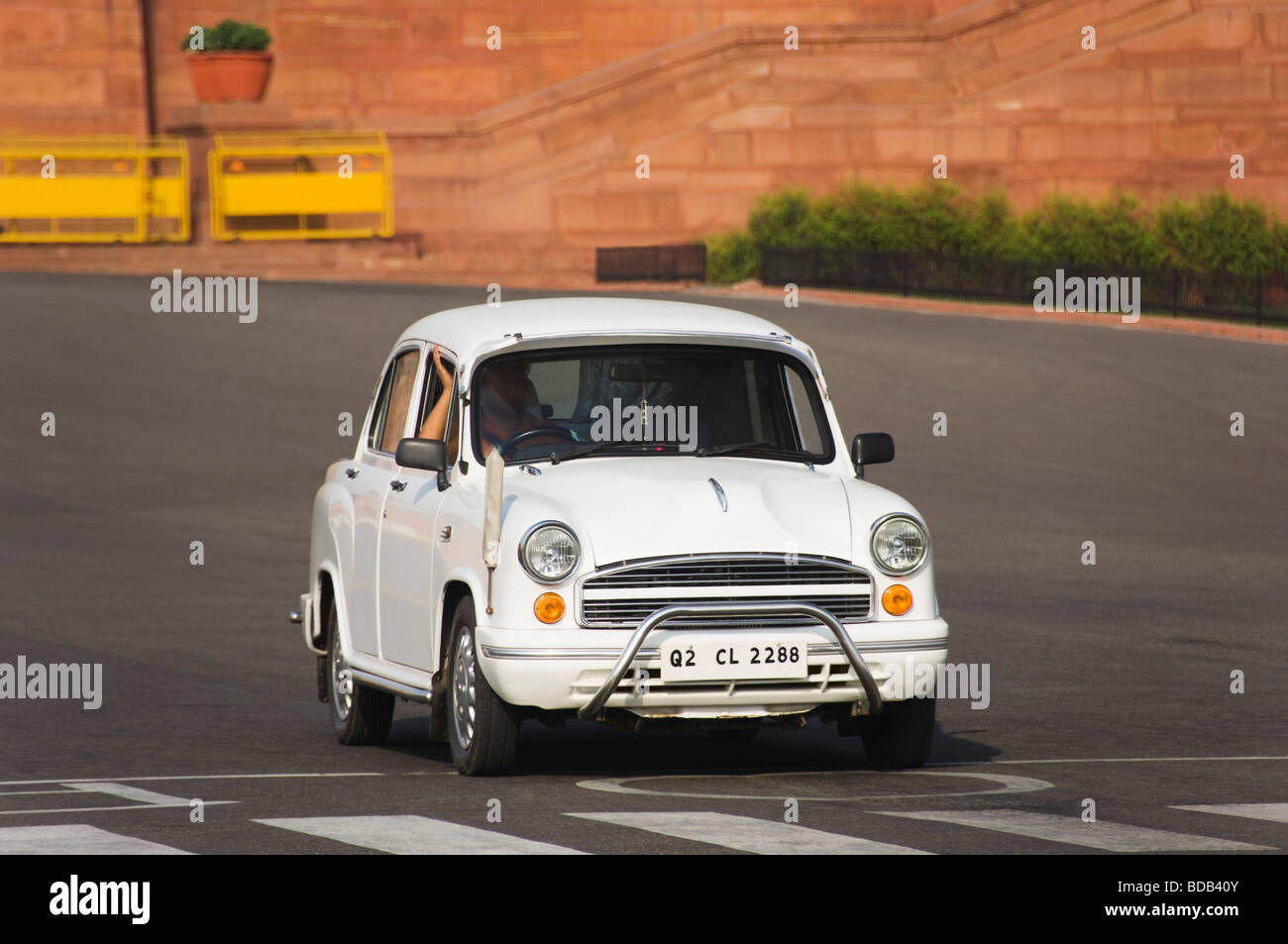 Ambassador car moving on the road, New Delhi, India Stock Photo