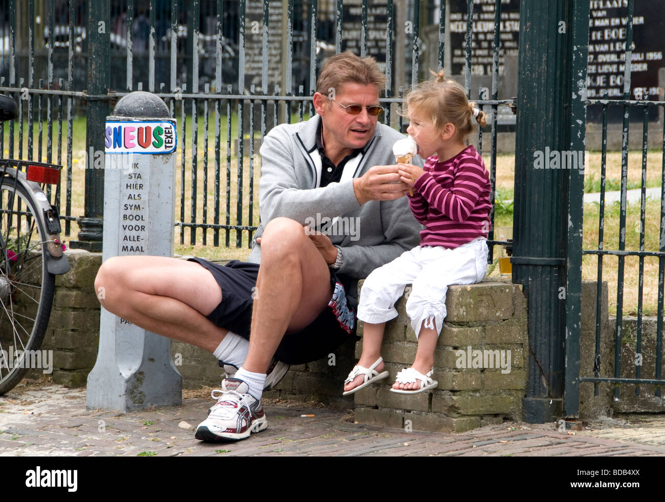 Father Daughter Man Little girl Ice Cream Netherlands Stock Photo