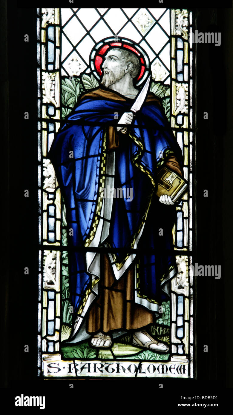 Stained Glass Window of 1923 by William Morris & Co depicting Saint Bartholomew, Earls Barton Church, Northamptonshire, England Stock Photo