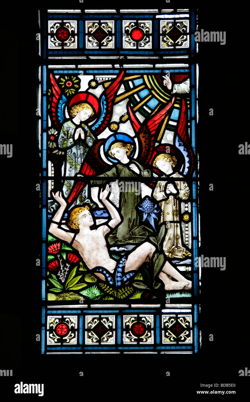 Stained Glass Window of 1872 by Bell & Almond depicting Genesis 1 26; The Creation of Adam, Earls Barton Church, Northamptonshire, England Stock Photo