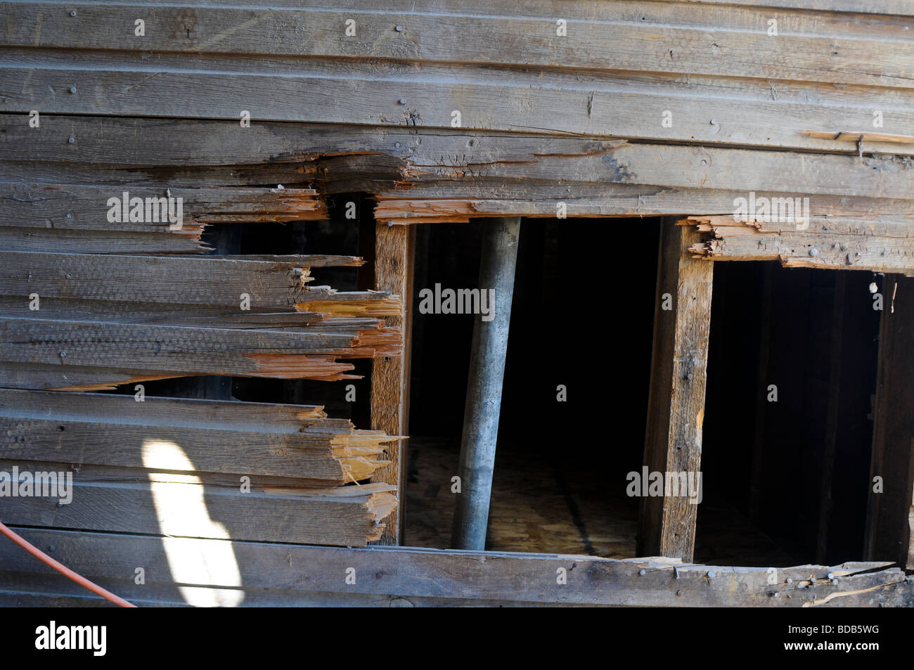 Hole in the side of a house Stock Photo Alamy