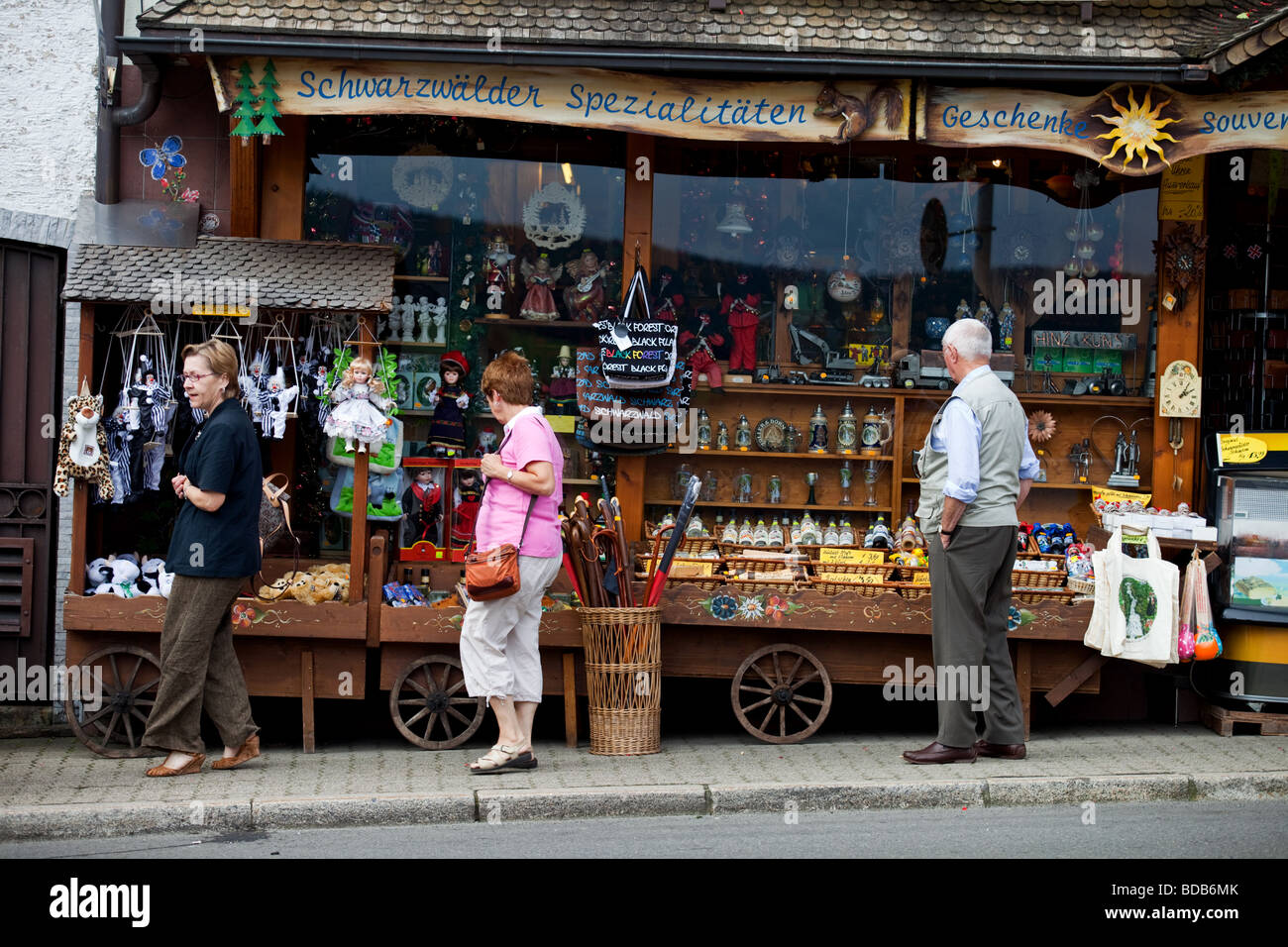 Tourists in front of souvenirs shop in Triberg, Schwarzwald, Germany. Stock Photo
