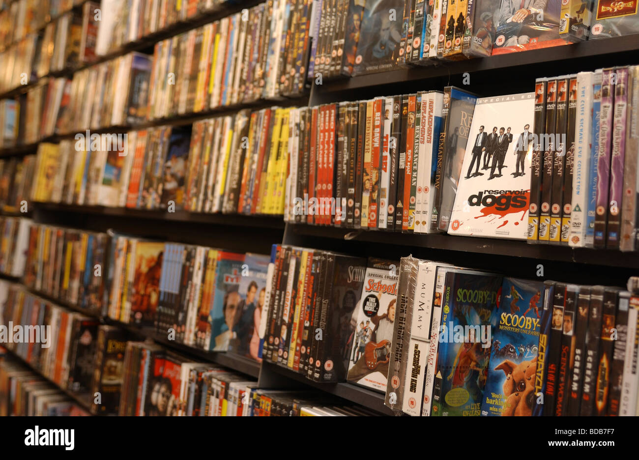 A shelf of DVDs for sale in a high street store Stock Photo