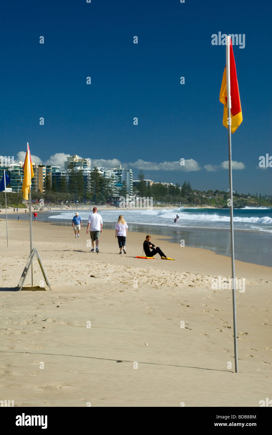 Volunteer lifesavers' safety zone flags at Mooloolaba Sunshine Coast Queensland Australia Stock Photo
