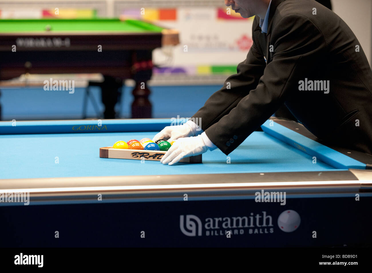 Man Racking the balls in Billiards 9 Ball competition, World Games, Kaohsiung, Taiwan, July 23, 2009 Stock Photo