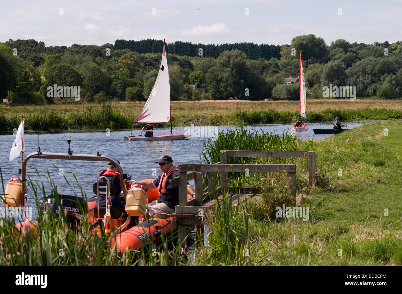 People sailing on the River Stour at Friar's Meadow in Sudbury, Suffolk, England Stock Photo