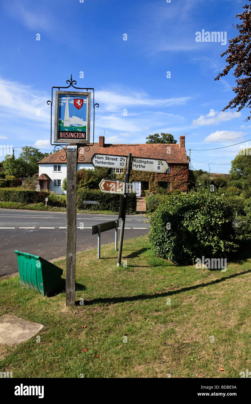 Bilsington crossroads with village sign Road Signs and Tour Sign traditional cottage Kent UK Stock Photo