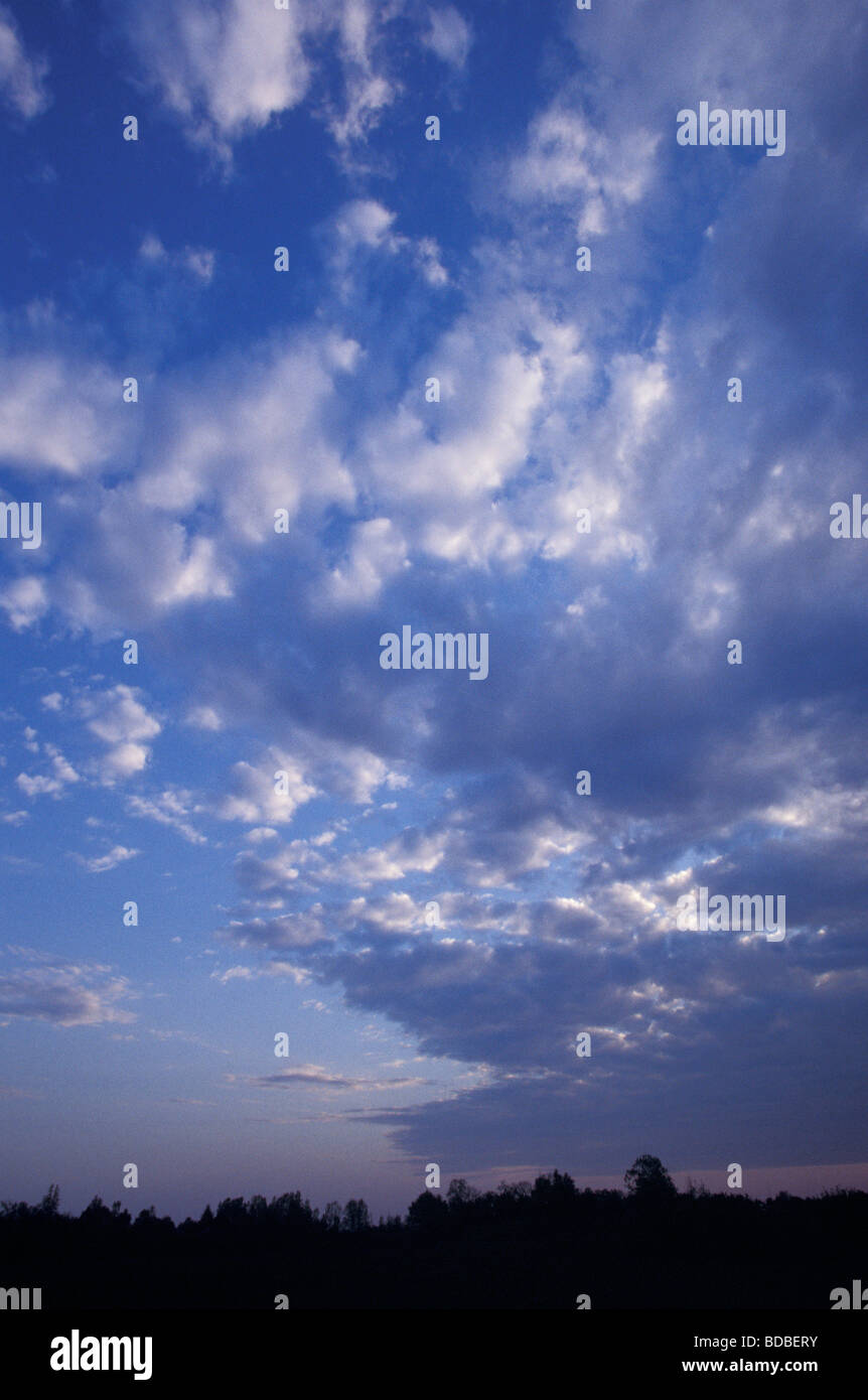 Stratocumulus Altocumulus and Altostratus Cloud in Evening Sky Stock Photo