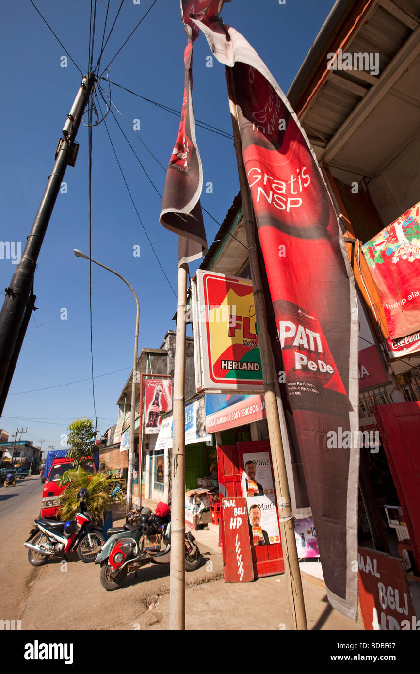 Indonesia Sulawesi Barru colouful banners outside mobile phone shop in main street Stock Photo