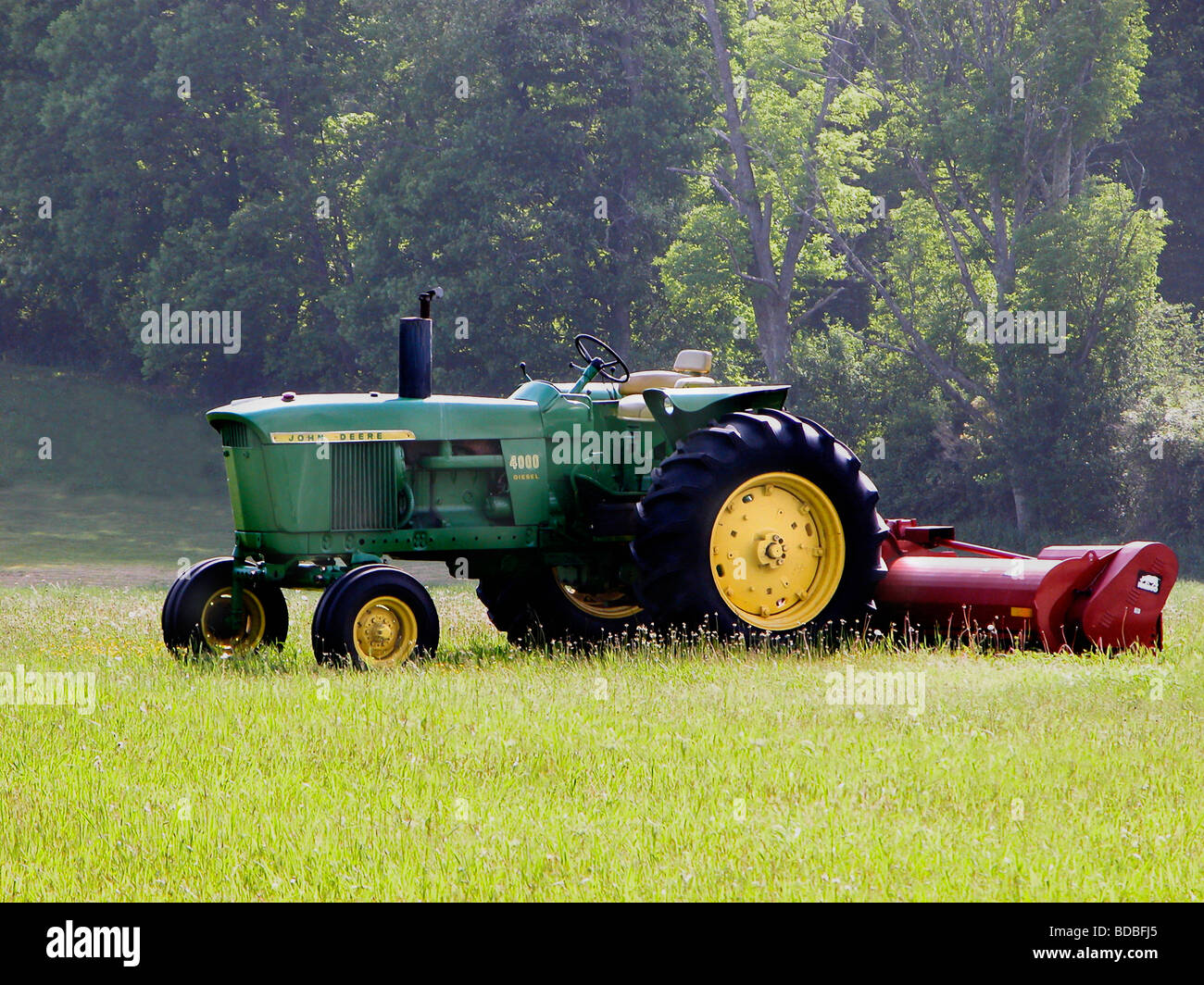 older john deere green tractor on grass Stock Photo Alamy