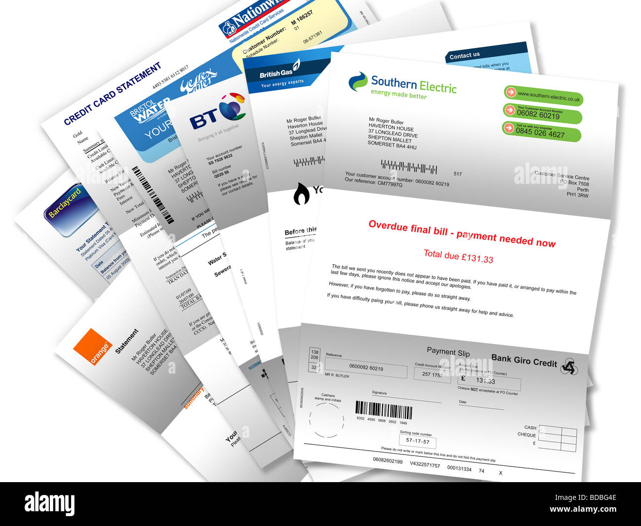Bills (gas, electricity, telephone, mobile, water and credit cards) on white background. Stock Photo