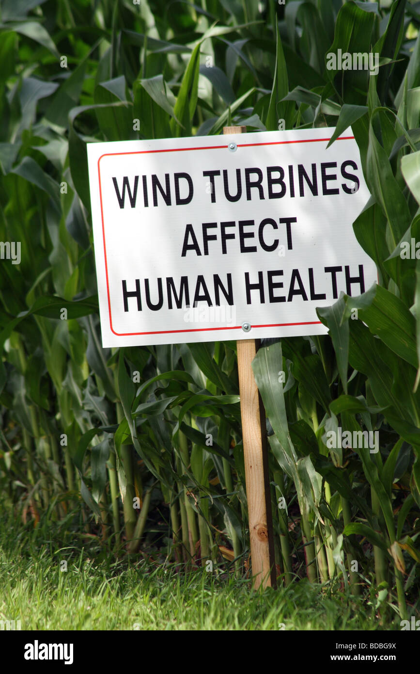 Wind Turbines Affect Human Health Sign Next to Southwestern Ontario Corn Field Stock Photo