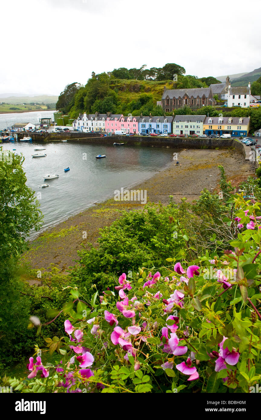 White, pink & blue coloured harbour front houses at Portree. The capital of the isle of Skye Stock Photo