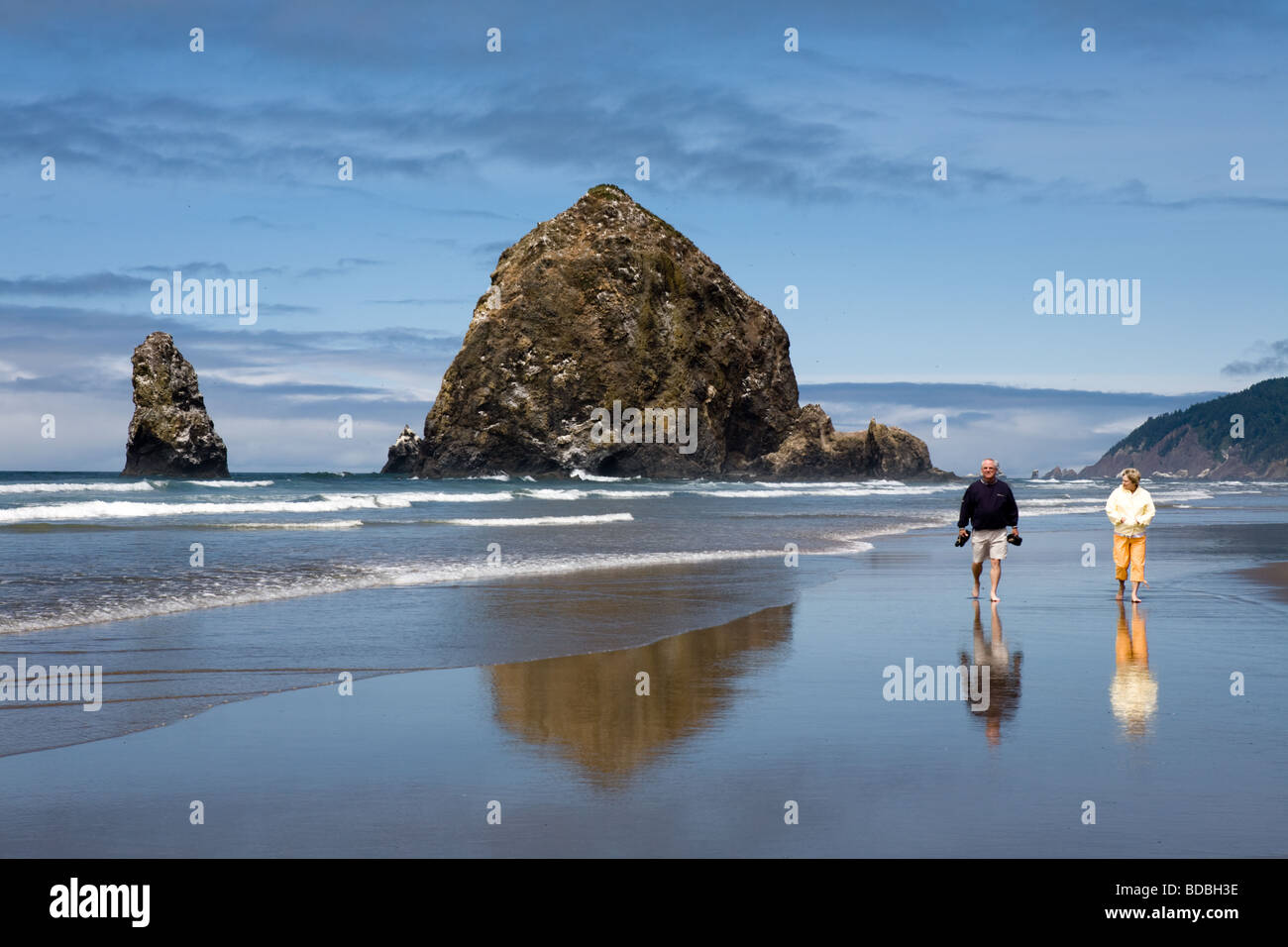 Haystack Rock is a 235 foot tall monolith aka sea stack at Cannon Beach ...