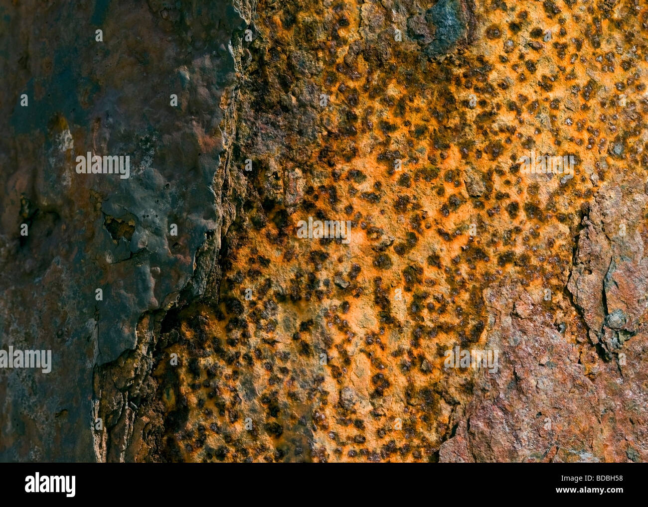 Colour, shape, form and texture on an oxidized iron pipe Stock Photo