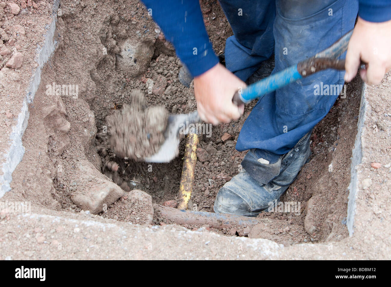 British Gas workers replacing old metal gas pipes with plastic ones as