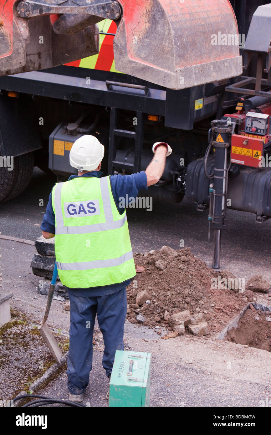 British Gas workers replacing old metal gas pipes with plastic ones