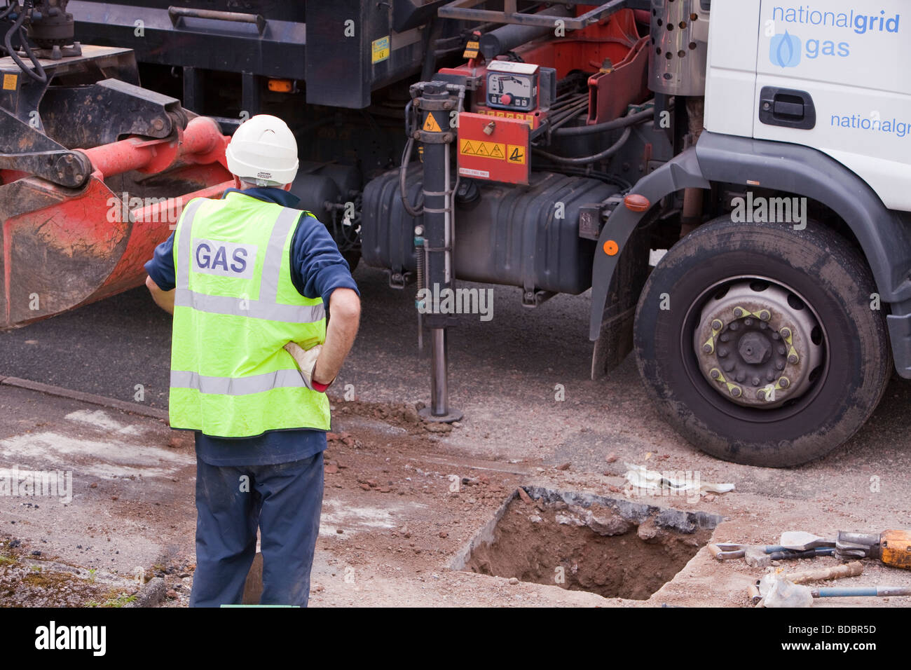British Gas workers replacing old metal gas pipes with plastic ones