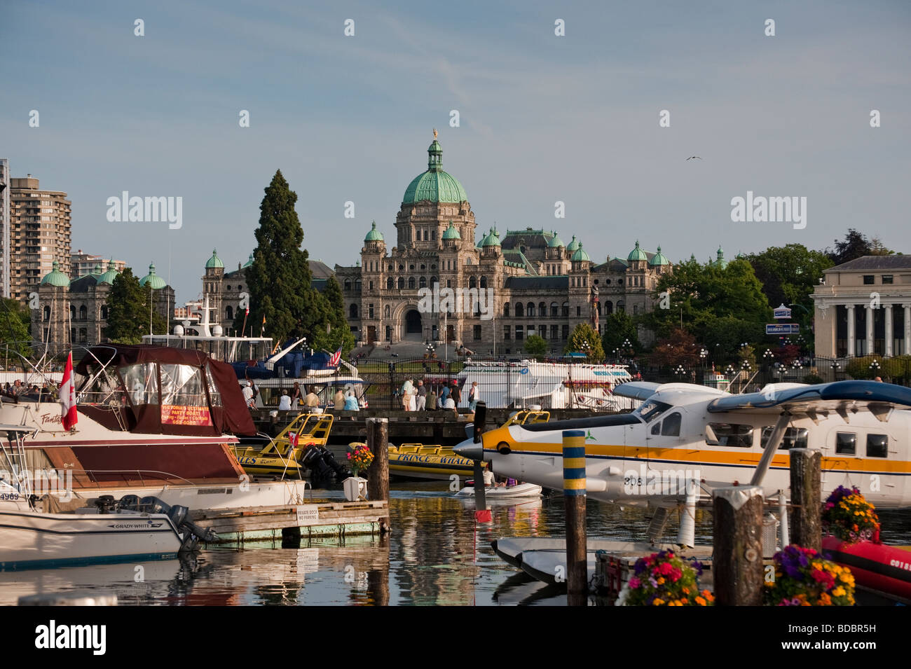 Victoria, British Columbia's inner harbour is dominated by the Parliament buildings and is a tourist destination and a landmark. Stock Photo