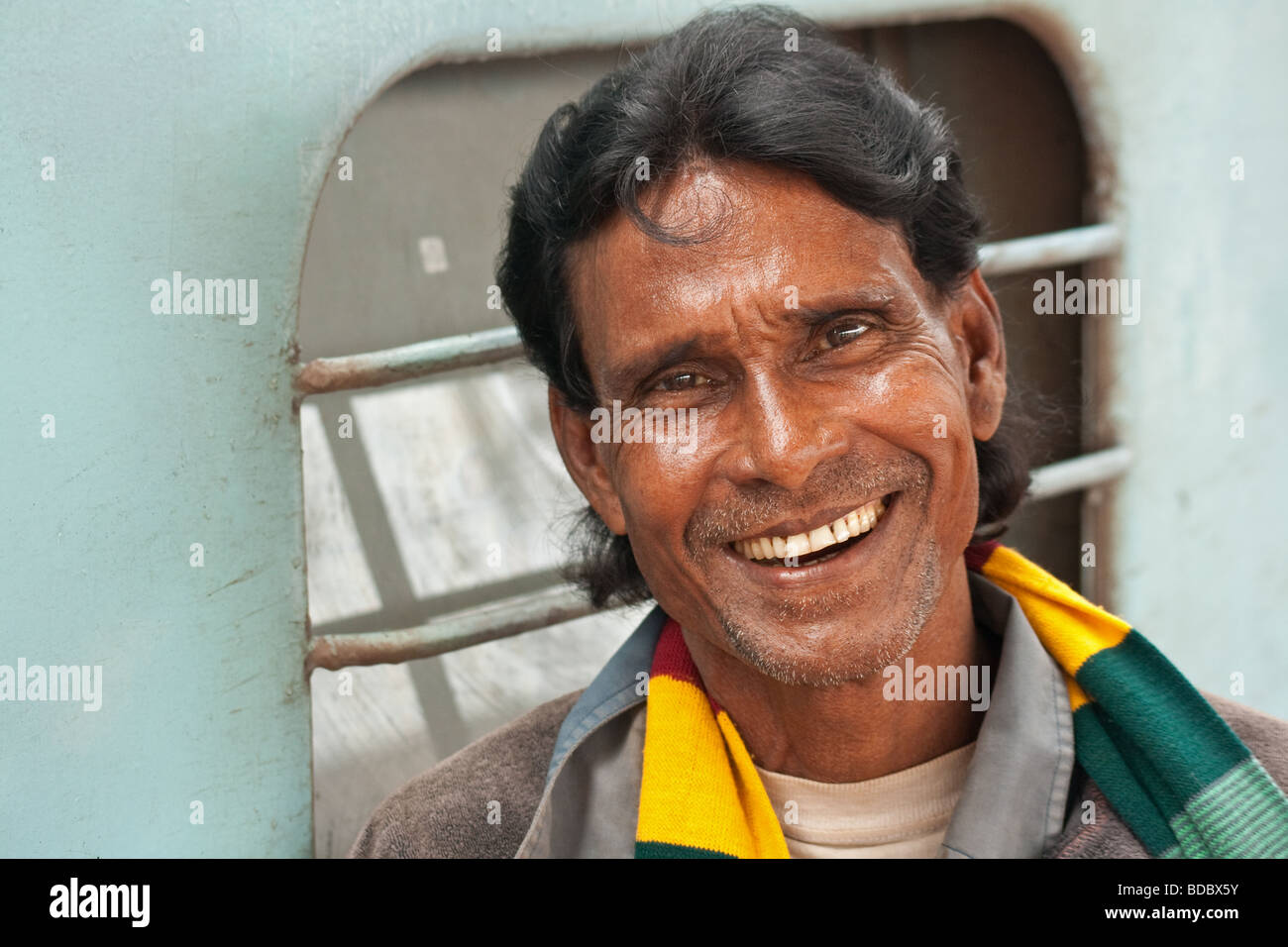 Indian Railways worker looking quite chuffed with himself at Puri station, Orissa, india Stock Photo
