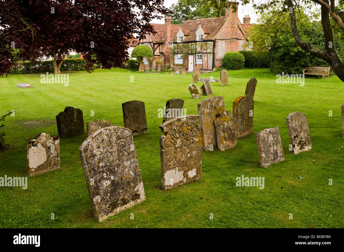 Gravestones at St Mary the Virgin village churchyard Turville Buckinghamshire UK Stock Photo