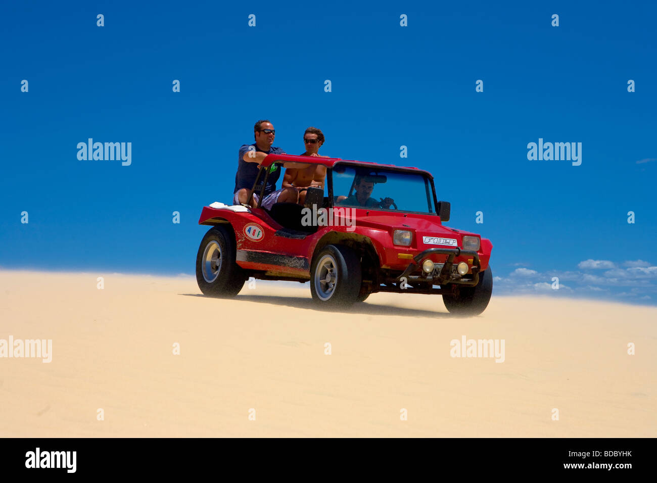 Tourists Riding A Beach Buggy On Sand Dunes Mundau Brazil Stock Photo