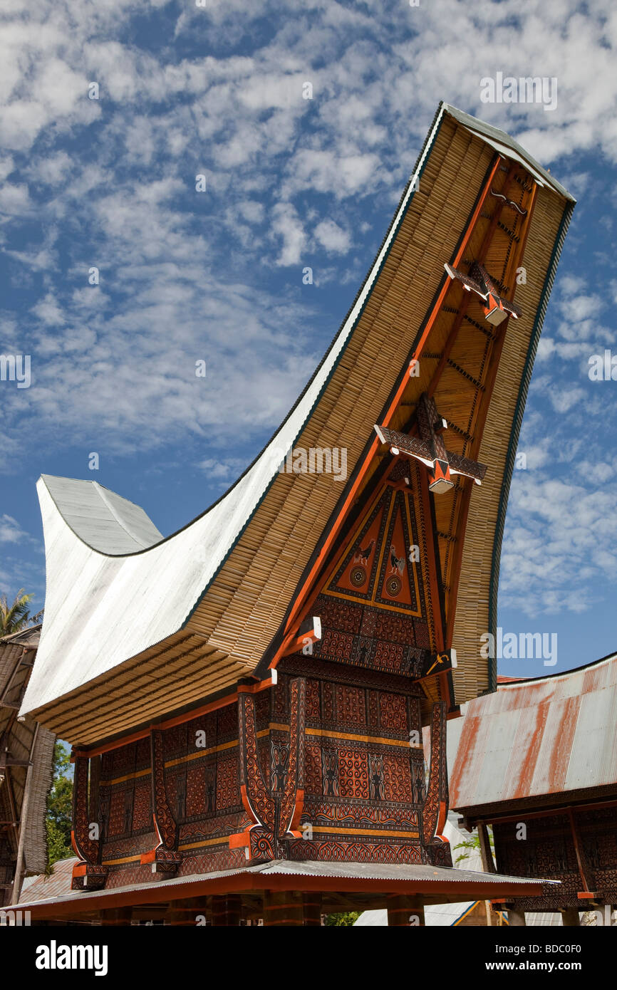 Indonesia Sulawesi Tana Toraja Bebo recently built tongkonan rice barns in family compound Stock Photo