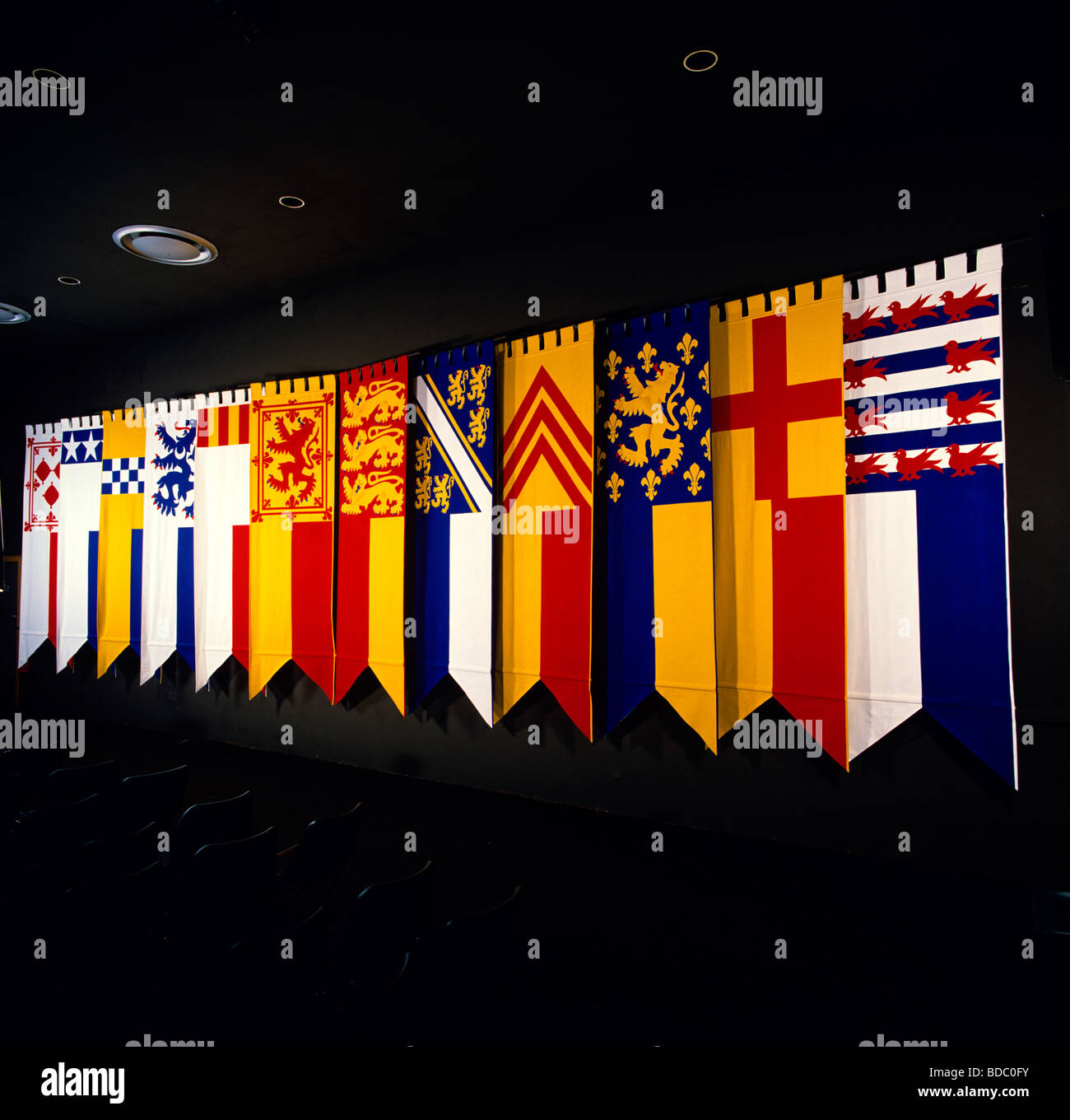 A display of Scottish heraldic banners at the Bannockburn Heritage Centre in Sterling Stock Photo