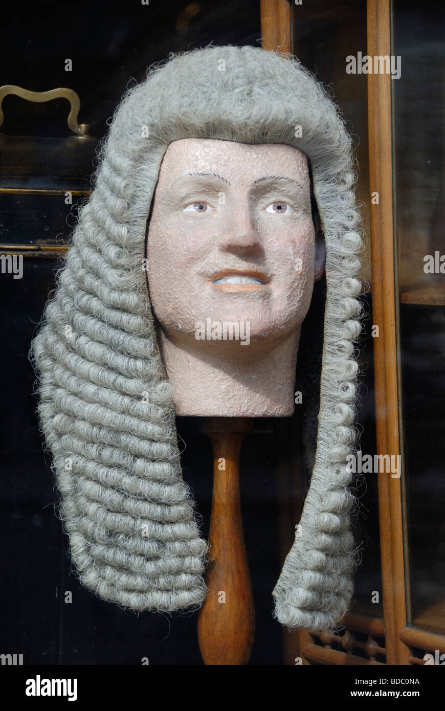 Bust of a British judge wearing a traditional wig Stock Photo