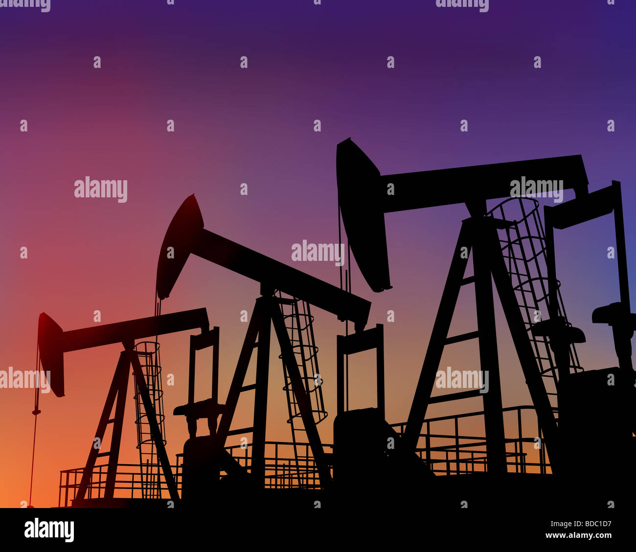 Illustration of three oil wells in the desert at dusk Stock Photo