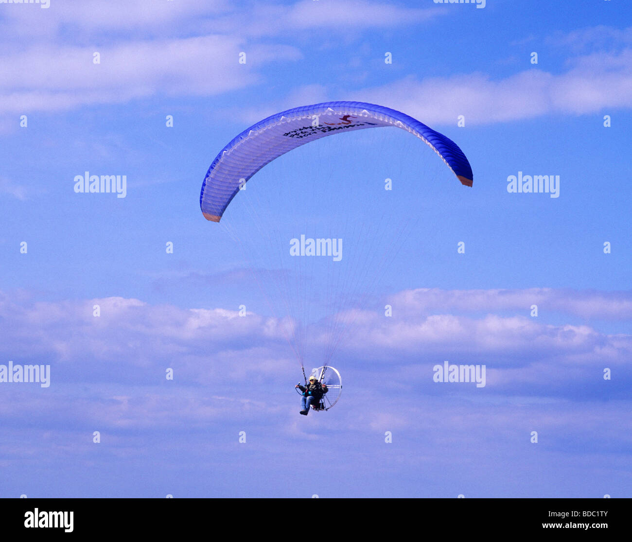 Hang Glider gliding parachute parachutist gliding paraglide glide flying sport leisure active activity open air pursuit Stock Photo