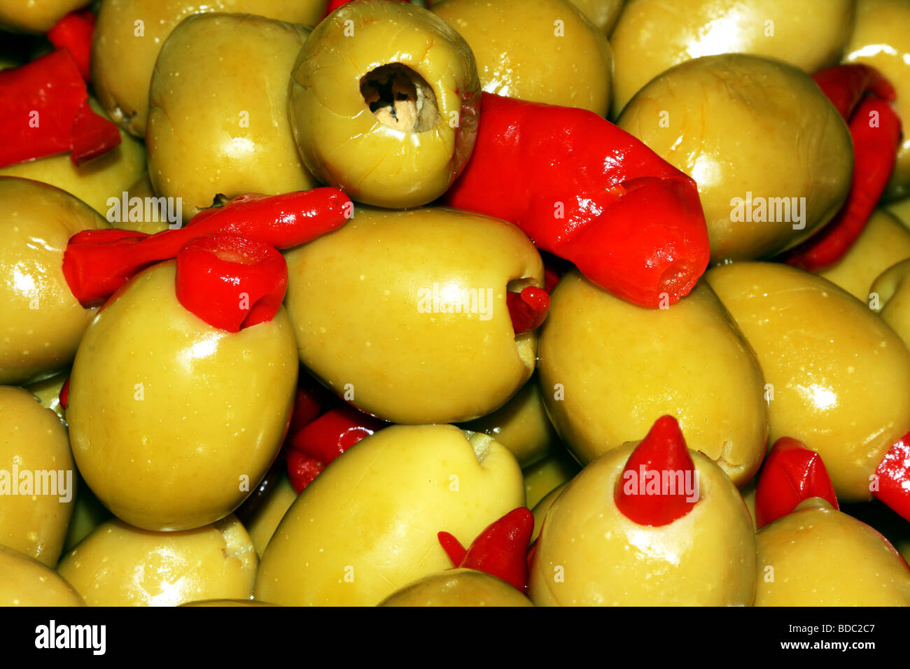 Colourful stuffed Green Olives showing Red Pimentos from the Mediterranean Stock Photo Alamy