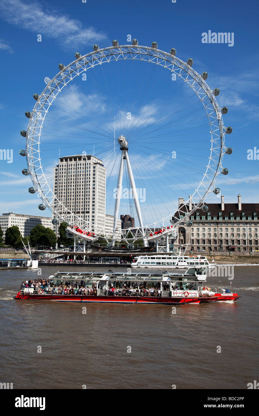 Tour boat in central London. With the London Eye and other attractions, this is a busy tourism area. Stock Photo